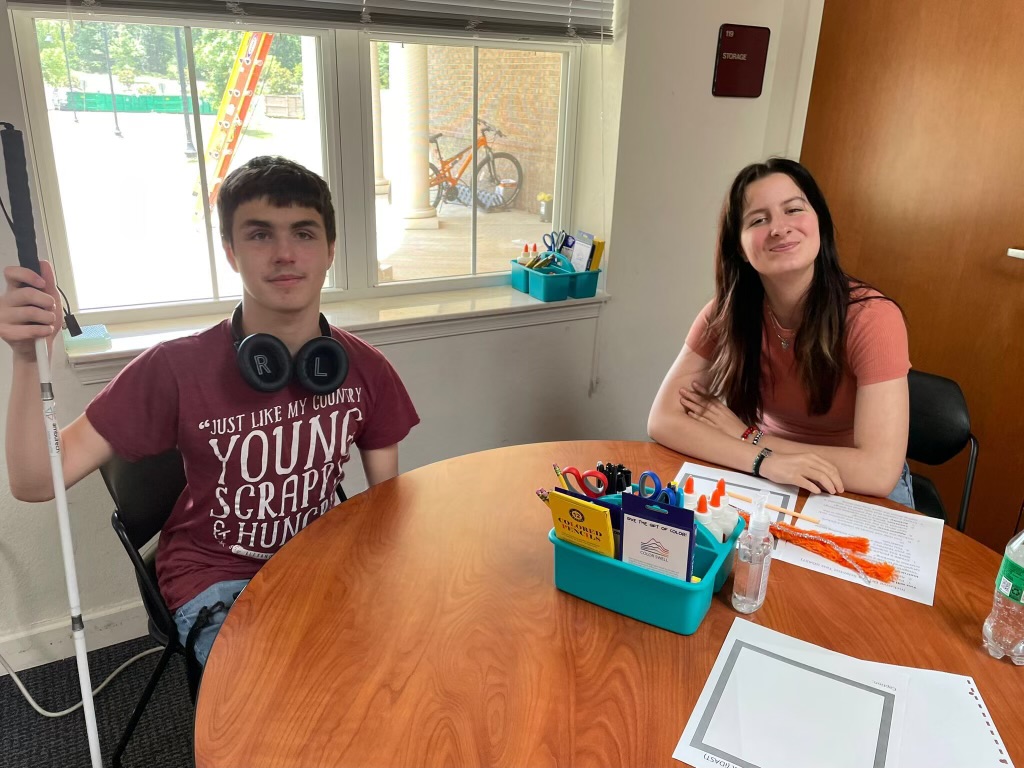 Justin doing arts and crafts at the STEM camp.